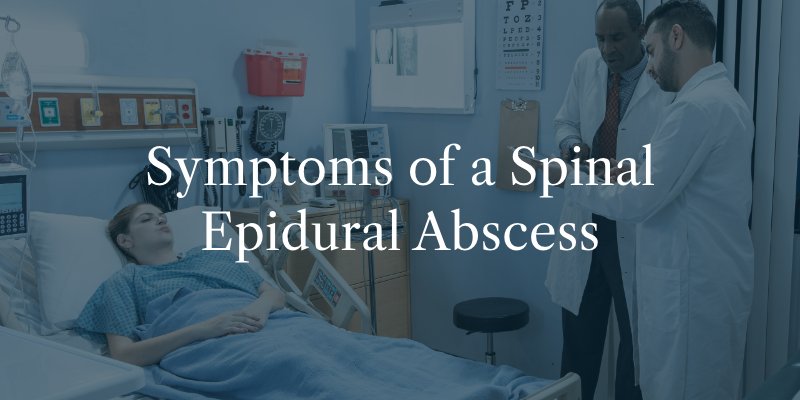Doctors Discussing Symptoms of a Spinal Epidural Abscess 